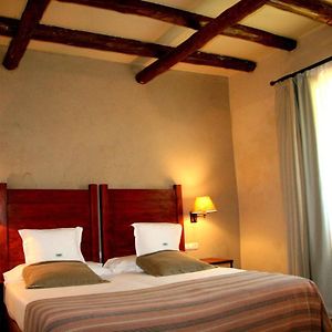 Habitación Estándar con Cama Queen